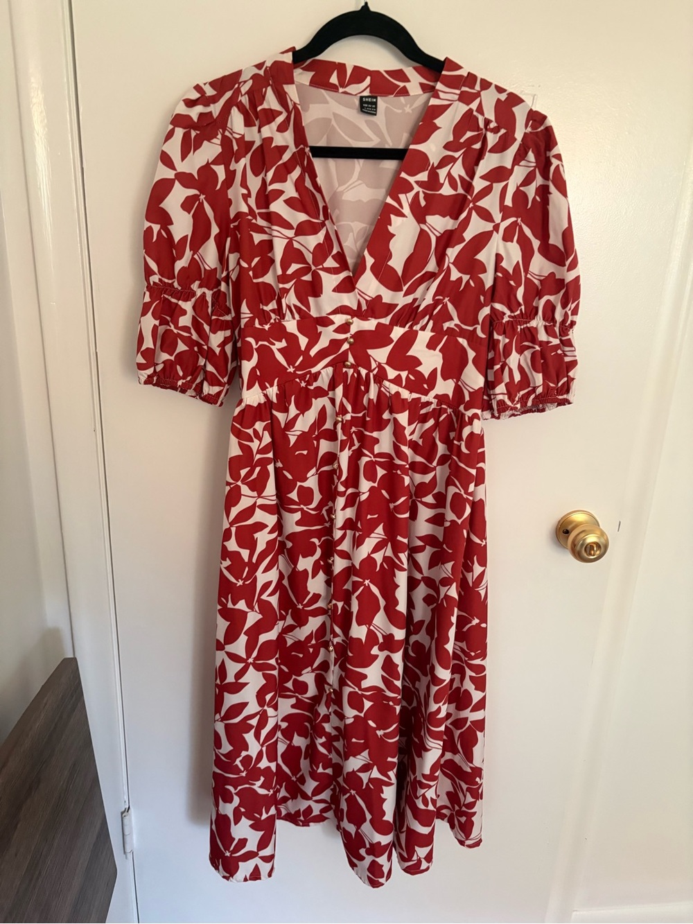Burnt Orange and white midi dress with gold buttons down the front.